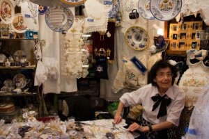 Woman selling hand made items at the synagogue