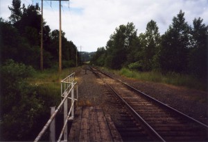 Train tracks by the water feature