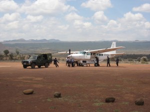 Pulling the plane with the blown tire off the runway