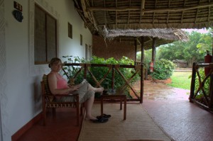 Marion reads on the patio