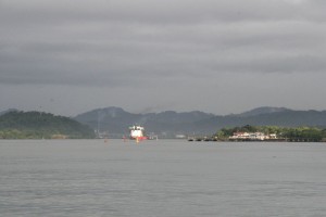 A ship heads into the canal