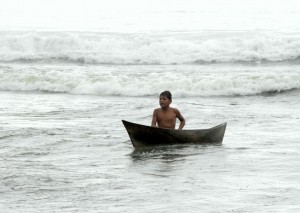 Boy and canoe