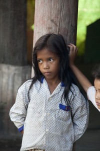 Girl at the palm oil house