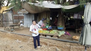 Our guide Bros shows us a banana fruit