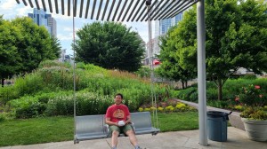 Daniel enjoys a porch swing along the river