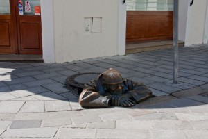 Manhole guy sculpture