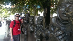 Daniel admires the hockey statues