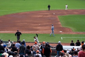 Conor Gillaspie about to go over the rail into the camera bay (but makes the catch)