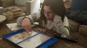 Elizabeth playing Scrabble