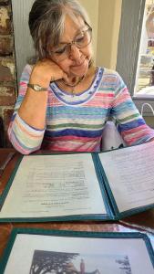 Marion peruses the menu