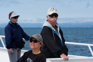 Mom, Marion and Jim look for whales (in different directions)