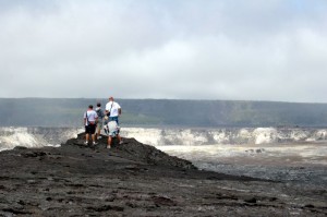 Tourists check out the crater