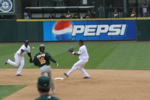 Yuniesky Betancourt and Jose Lopez turn the double play 