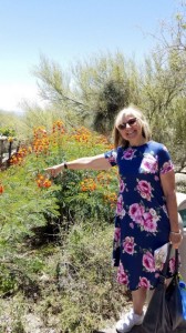 Marion points out the orange flowers